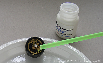 A drop of 'white henna' in a cap