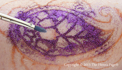 Brush glitter on 'white henna
